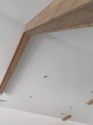 Scribing beams to the ceiling. #bluecollar #tradesman #larpentry #carpenter #trimcarpentry #fauxbeams 