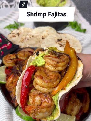 Quick and Easy Shrimp Fajitas- perfect for dinner or any occasion, they come together in 20 minutes Ingredients:  1 red bell pepper  1 orange bell pepper  1 red onion  2 tbs olive oil  1/2 tsp salt, or to taste  Black pepper, to taste  1 tsp taco seasoning  Charred Tortillas, for serving (about 8 small ones)  Lime, for serving  Shrimp  1 lbs @lobsteranywhere Black Tiger Shrimp 2 tbs olive oil  1/2 tsp salt  1 tsp smoked paprika  1 tsp taco seasoning  1 tsp @hippypilgrimgarlicsalt chipotle lime seasoning, optional  1/2 lime, zested  Guacamole 1 avocado  2 tbs red onion, chopped  1/2 -1 jalepeno, diced  1 lime, juiced  1 tbs cilantro, chopped  1/2 tbs salt  Method:  1. Wash and cut peppers into strips; slice red onion and set aside;  2. Clean and butterfly shrimp and season with olive oil, smoked paprika, salt, taco seasoning and lime zest;  3. To make guacamole- smash avocado and mix with red onion, jalepeno, cilantro, lime juice and salt;  4. Sauté peppers and onions in olive oil, season with salt, pepper and taco seasoning and cook until charred; make a well in the middle and quickly cook shrimp for about a minute per side;  5. Char your tortillas on a pan or directly on the gas burner;  6. To assemble- add guacamole, shrimp and veggies, squeeze some extra lime and enjoy! #shrimp #shrimprecipe #recipeshare