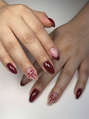 The last set of 2024 🎀  . . #rednails #christmasnails #nailart #shortnails #naturalnails #almondnails #bownails #trendingreels #trendingnails #frenchnails #buildergelnails #biabnails #nailsnailsnails #houstonnailtech #houstonnails #structuredmanicure 