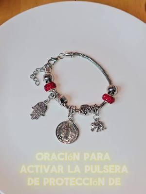 Oración para Activar la Pulsera de Protección de San Benito En el nombre del Padre, del Hijo y del Espíritu Santo, invoco la presencia divina y la intercesión de San Benito, protector contra el mal y defensor de la fe. Oh glorioso San Benito, te pido que bendigas esta pulsera como un escudo de protección y luz en mi vida. Que tu santa cruz me guíe en el camino correcto, que tu fuerza aleje toda sombra de maldad y que la gracia de Dios siempre me acompañe. Esta pulsera será un recordatorio de tu poder y amor divino. Que al llevarla conmigo, esté protegido de todo peligro, tanto físico como espiritual. Que toda energía negativa sea transmutada en luz, y que mi corazón esté siempre lleno de fe, amor y confianza en el Señor. Por la señal de la Santa Cruz, líbranos de nuestros enemigos, oh glorioso San Benito, y condúcenos hacia la paz eterna. Amén. #protección  #sanbenito  #contraenvidias #amuletosdeproteccion  #amuletos  #amuleto 