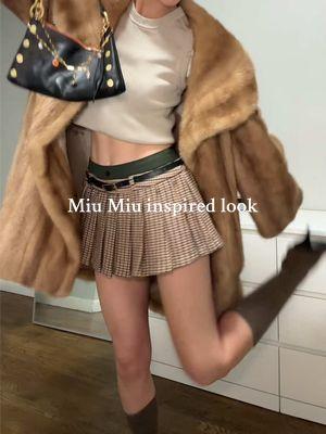 what do you think? Miu Miu inspired look in 20 degrees tonight                                       #getdressedwithme #newyorkcity #miumiu #inspiredlook #miniskirt #asmr #grwm #coldweatheroutfits @Miu Miu     skirt @Bloomingdales  heels @Tony Bianco  cardigan @Everlane  sweater @TORY BURCH 