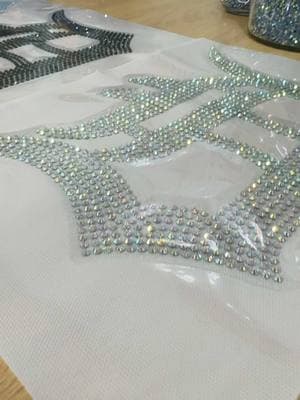 I cannot wait to see how amazing these look when they are pressed! #rhinestonetransfers #luxuryapparel #glassrhinestones 