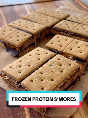 Have you guys tried the viral protein s’mores? IB: @Gracie Norton  They taste just like s’mores but in ice cream and I added peanut butter, which really makes these next level! This version is gluten-free, dairy-free, and vegan!  Keep these in your freezer to enjoy anytime the sweet craving hits! I will be making these over and over again.  Comment PROTEIN and I will send you a link to my fav protein powder! Here’s how to make them: 1 container thawed coco whip 1 -2 scoops vanilla or chocolate protein powder (I used @kachava, my fav!) 1 cup chocolate chips, I used @hukitchen 1 tsp coconut oil 1/3 cup natural peanut butter 28 graham crackers (exact quantity will depend on what brand you use bc they vary in size - I used @kinnikinnickgf gluten-free grahams that I got at @wholefoods) Flaky salt, optional Line an 8x8 square dish with parchment paper. The clips help keep it in place. Add one layer of graham crackers. Melt chocolate and coconut oil in the microwave, for 2-3 30-second increments, until completely smooth. Pour 1/2 the chocolate on top of the graham crackers, spreading evenly, then place the tray in the freezer for 10 minutes. Next, mix the coco whip and protein powder until completely smooth. Bring the tray out of the freezer and spread the coco whip mixture on top, in an even layer. Then spread the peanut butter evenly on top, followed by the remaining melted chocolate, then add another layer of graham crackers on top, gently pressing them down. Pop the tray back into the freezer for at least one hour. Sprinkle with flaky salt, if using! Then cut a square and enjoy! #foodtrends #EasyRecipes #proteinrecipes #smores #frozensmores