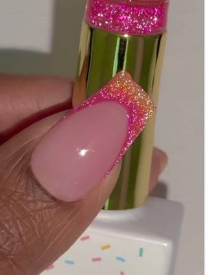 Cake Glaze G19-02 (hot pink reflective) ombréd with G19-04 (orange reflective) 💅🏾🧁🩷 Grab these goodies now from The Nail Cakery app or The Nail Cakery.com 💖 #nails #nailart #gelnails #nailpolish #gelpolish #nailtech #manicure #thenailcakery #nailsupplies #blackowned #womanowned #reflectivenails #reflectivegel #glitter 