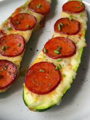 ✨Zucchini Pizza Boats✨ If you’re looking for a creative way to enjoy all the flavors of 🍕 pizza without all the carbs, these Zucchini Pizza Boats are just the ticket. They evoke all those pizza flavors we crave but are veggie-packed and low-carb. They’re the perfect low-carb idea when the pizza craving strikes. These only take a few ⏲️ minutes to prep and you can cook them in the air fryer if you don’t feel like turning on the oven. If you make these, let me know how you customized them in the comments!  Ingredients * zucchini  * pizza sauce * mozzarella, any cheese you like works * pepperoni slices, you can use turkey pepperoni or ham as well https://themodernnonna.com/zucchini-pizza-boats/ #lowcarb #lowcarbrecipes #recipes #recipetok 