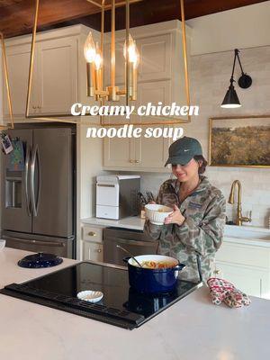 Creamy home style chicken noodle soup🥣✨ INGREDIENTS: 64 oz chicken broth  1 block cream cheese, room temp  4 tbsp butter 1 rotisserie chicken shredded (or cook chicken) 5-6 carrots depending on size, chopped 5 stalks celery, chopped 3 green onion or could use white onion  1 tbsp minced garlic Salt  Pepper Ranch seasoning, about 1/2 packet  12 oz Egg Noodles  DIRECTIONS: In a large pot sauté carrots, celery, onion, and butter.  Once veggies are softened I add minced garlic and 1 block of softened cream cheese.  Stir in and let the cream cheese melt completely then stir again.  Increase to high heat, Stir in 2 boxes of chicken broth, shredded chicken and seasonings (salt, pepper, ranch seasoning) bring to boil.  Add 12 ounces of egg noodles and boil until Al dente.  Serve with crackers. If needed add water or more chicken broth to make it more soupy or if you are reheating the next day. #homestylechickennoodlesoup #chickennoodlesoup #onepotdinner #EasyRecipes #relatablemom #familyfriendlydinner #homemadechickennoodlesoup #wintermeals 