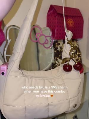 this bag is going viral rn bc of the lulu bag, I’m so glad I already had it! 😍 added this cute charm 🍒 & it’s giving *linked both* #lulu #westbronco #pufferbag #cutecombo #spacious #fypシ #ttshop #newyear #girlythings #itsgiving #obsessed 