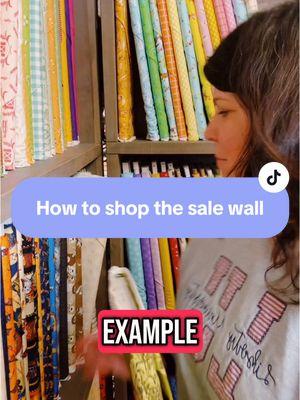 Fabric is super expensive so we like to encourage people to shop the sale wall however it can be hard for a new quilter to go to the sale wall and look at Fabric and figure out what to buy so I have a few tips and tricks that you can use when you’re shopping in your local fabric store to help you out. #quilting #sewingtipsandtricks #beginnerquilter  