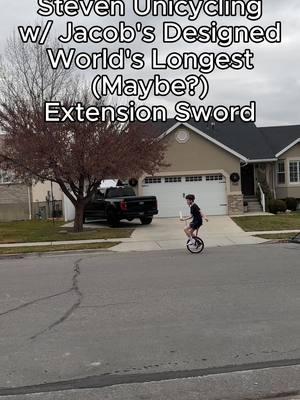 Watch out cause here he comes, Steven unicycling with the World's Longest (maybe it's the longest we didn't actually check, so probably not) extension sword designed by Jacob. #10kids #oldestson #unicycling #swordfighting