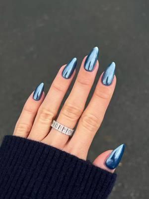 The perfect combo for the viral icy blue chrome nails revealed ❄️💙 This shade on @nailsbysmf is EVERYTHING 🤩  Get the look: ✨Apply one coat of DND/DC/ or DIVA base gel, cap the free edges and cure for 30-45 seconds making sure to clean, buff, and prime nails before hand ✨Apply 2 coats of Blue Lagoon DIVA 246 and cure for 45-60 seconds each   ✨Apply DC 900 Top Gel No Cleanse and cure for only 30 seconds  ✨Apply DND Silk Effect Chrome Powder #02 with a gloved finger or using an applicator. Making sure to not rub too harsh  ✨Brush off remaining excess with DND 🎀pink🎀 dust brush  ✨Apply final coat of DC 900 Top Gel No Cleanse and cure for 30 seconds  ✨Apply cuticle oil daily  #dndgelpolish #chromenails #nails #bluenails #navychromenails #glazednails #haileybieber #nailsofinstagram #dndgel #chromepolish #byrdie #popsugar #cosmopolitan #trendingnails #diynails #nailsofinstagram #prettynails #nailsinspiration #nailsinspo 