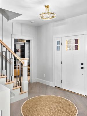 Horizon by @Benjamin Moore 🤍 We get asked often about the paint color we used for our foyer trim. Do you prefer a true white trim, or a softer off-white shade? This color, which is a very pale gray with some subtle blue undertones because it’s a little less harsh than a stark white. #trimpaintcolor #paintcolorideas #neutraltrim #neutralpaintcolors #foyerdesign #entrywaydesign #trimcolor #offwhitepaint 