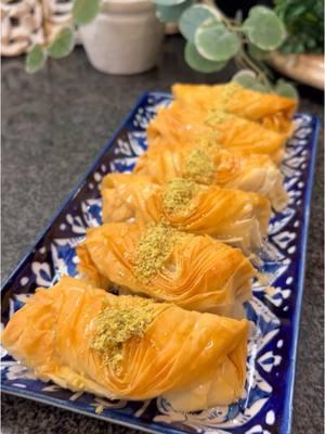 Baklava Ingredients: 8 sheets of of phyllo (14”x18”) Melted butter or ghee For Simple Syrup: 1/3 cup granulated sugar 1/3 cup water 2 lemon slices 1/2 cup ricotta cheese 1/2 TBSP rose water 1/2 TBSP sugar  1/2 cup crushed almonds  1 TBSP sugar  Air Fry at 300F for 25-30 minutes - check after 15 minutes  Last 2-3 minutes on 325F to give it a brown color  #Baklava #BaklavaRecipe #HowToMakeBaklava #TurkishBaklava #HomemadeBaklava #EasyBaklavaRecipe #EasyBaklava #GreekBaklava #BestBaklavaRecipe #WalnutBaklava #BaklavaRolls #TurkishBaklavaRecipe #BaklavaRecept #HomemadeBaklavaRecipe #BaklavaRecipeFromScratch #PistachioBaklava #GreekBaklavaRecipe #BestBaklava #BaklavaDough #HowToMakeBaklavaAtHome #EasyBaklavaRecipeAtHome #BaklavaAtHome #BaklavaDish #BaklavaHomemade #Baklawa