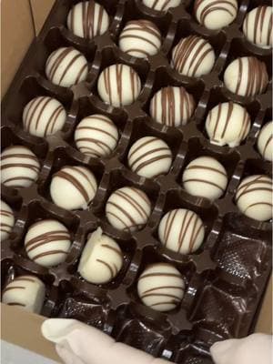 Truffles on the move 👀 #truffles #truffleshuffle #chocolatetruffles #chocolate #chocolatelover #chocolatier #candy #candymaking #candytok #asmr #candymaker #candyshop #candystore 