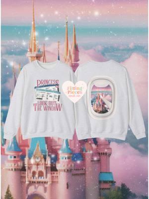 A shop classic, and MUST have travel top: Window Seat Princess 💕✈️✨ Available in both DisneyWorld & Disneyland styles! ☁️ The plane ticket details are everything 🩵✨ . . #princesslookoutthewindow #theprincessdiaries #theprincessdiaries2 #theprincessdiaries3 #disney #disneytrip #disneyflight #disneyvacation #disneysweater #disneysweatshirt #miathermopolis #princessdiaries #welcometogenovia 