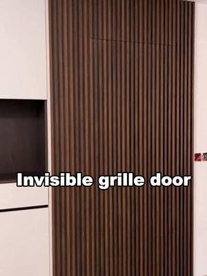 Invisible grille door#wpc #wallpanels #wpcwallpanel #wpcwallcladding #flutedwallpanel #buildingmaterials #walldesign #renovation #deco #harmercoverings #aleadtrend 