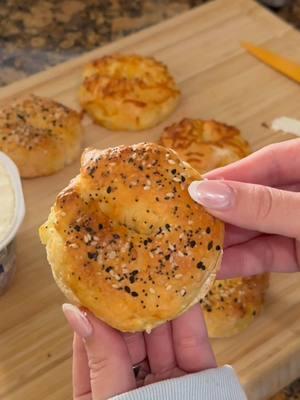 i will forever be obsessed with these 2-ingredient protein bagels🥯🤭  recipe:  -1 cup self-rising flour -1 cup of plain greek yogurt  optional: -egg wash -everything but the bagel seasoning -cheese #asmr #proteinbagels #breakfast #asmrbreakfast #breakfastasmr #bagels #homemadebagels #2ingredientbagels 