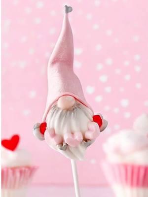 🎀 💕Let’s Make This Super Sweet Valentine Gnome Cake Pop!🎀 💕 Ready to add some love to your Valentine treats?  💕Follow these steps to create the most adorable sweet valentine treat💕 ✨ Start with **My Little Cakepop’s Cone Cake Pop Mold** for the base.  ✨ Dip your cake pop in your favorite shade of pink chocolate. (Use Colour Mill available on our website). ✨ Use our fondant string of hearts mold. ✨ Beard made with @unforgedible_arts exclusive hand crafted beard made made to fit perfectly with our cone cake pop mold. This creates perfect gnome beard and works for santa beards as well! ✨ Roll out the hat with our **heart impression roller** to give it a fun patterned design.  ✨ Hand-make the gloves for an extra personal touch.  ✨ Assemble your gnome using edible glue or candy melts.  ✨ Finish with a touch of lustre dust for a dazzling sparkle!  🎥Video and cake pops by @Unforgedible Art  #CakePopMold #CakePopDecorating  #mylittlecakepopmolds  #mylittlecakepop #unforgedibleart #cakepopideas #cakepopshapers #cakepopplungers #cakepoptutorial #ValentineTreats #CakePopInspo #GnomeCakePop #MyLittleCakepop 