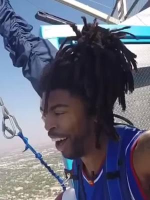 The world’s highest slam dunk! 🏀🪂  @"Hammer Harrison" from 855-feet up.  #harlemglobetrotters #trickshot #recordbreaking 