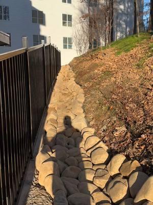 Dry creek bed #fyp #lawntok #landscaping #drainage #transformation 