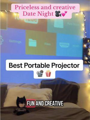 Creative and fun date night using this portable WiFi projector with a built in speaker. #portableprojector #projector #movienight #familymovienight #giftidea #4kprojector #wifiprojector 