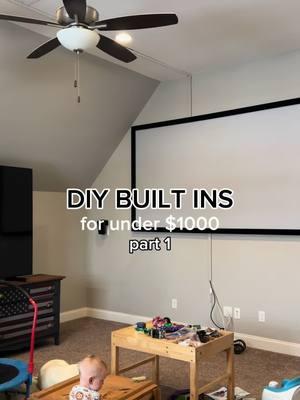 DIY Built-Ins on a Budget: Part 1! ✨ Total so far: $651.80 (cabinets, lumber, screws) Transforming this blank wall into gorgeous, functional built-ins for under $1,000 using stock upper cabinets! Today, I’m walking you through the first steps: planning the layout and building a sturdy base using 2x6 boards. This base gives the cabinets a raised, built-in look and sets the foundation for the rest of the project. Ready to see how it all comes together? Make sure to save this post and follow along—Part 2 is coming soon, and we’ll secure the cabinets and start adding our countertop! #DIYBuiltIns #BudgetFriendlyDIY #StockCabinetHack #StorageSolutions #HomeProjects #BuilderGradeUpgrade