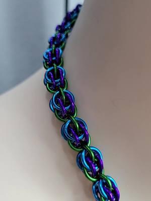 22 inch sweetpea chain in green, violet, and royal blue. Our sale is still going till February 14th #handmade #chainmail #chainmaille #necklaces #jewelry #accessories #alt #alttiktok #fashion 