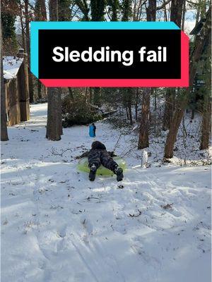 Thank goodness he had all those layers on… no tears were shed, only giggles. #snowday #asheville #northcarolina #sleddingfail #brothers #brotherlylove #MomsofTikTok #nc #828isgreat #828 #wnc #sledding #boymom 