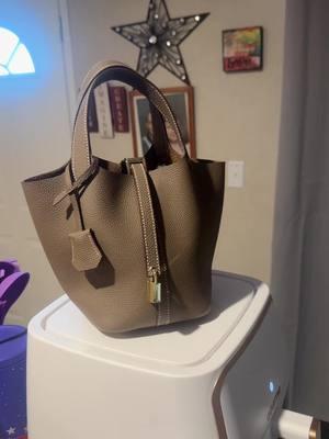 This bucket bag is everything! It’s made of cow hide leather and looks like the very expensive bucket bag not gonna say the name! Run and grab yours from this link you won’t be disappointed! I’m ordering every color! I purchased this bag it was not a sample. #fyp #dupe #run #cowhideleather #leatherbucketbag 