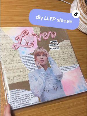 a custom sleeve wasn’t in the budget so i decided to use my creativity to my advantage. anyway can’t believe i finally have this record ✨✨  #fyp #foryoupage #LLFP #loverlivefromparis #loverlivefromparisvinyl #artist #taylorswift #swifttok #swiftie #collage #collageart #lover #recordcollector #vinyltok #vinylrecords @Taylor Swift @Taylor Nation 