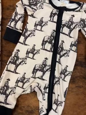 Hey baby! New cowkid goodies! 🖤🐴 #rodeolife #rodeo #rodeobaby #rodeobabyinthemaking #rodeobabyfashion #rodeokids #western #westernfashion #westernwear #westernbaby #babytok #yeehaw 