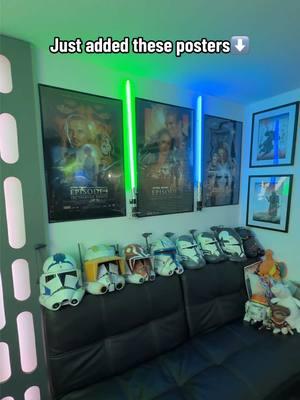 Here’s my Star Wars game room! - Finally put up those Ani/Ahsoka @Displate outside of the room door and moved the movie posters into the room! Mounted some sabers in between the poster as well. Let me know what you guys think!! - #starwars #starwarsfan #starwarscollector #starwarscollection #lightsaber #lightsabers #prequels #sequels #originaltrilogy #darthvader #vader #empire #sith #jedi #clonewars #starwarstheclonewars #collection #collector #starwarsnerd #bobafett #setuptour #pcsetup #RoomTour #fyp