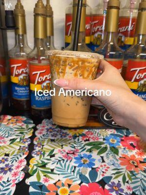 Iced white chocolate coconut americano, no water, splash of cream. 💖 #coffeetiktok #icedamericano #coffee #fyp #diycoffee #cafe #icedcoffee #breville #espressomachine #espresso 