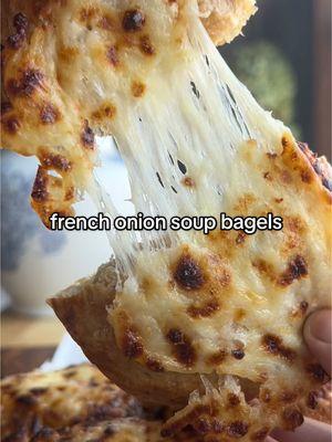 1 cup warm water 1 tbsp maple syrup or granulated sugar 1½ tsp dry active yeast 2 tbsp butter 1 large onion thinly sliced 3½ cups all purpose flour + more if needed for kneading 1 tbsp salt 1-2 cups shredded mozzarella cheese - In a large bowl, combine 1 cup of warm water, 1 tbsp maple syrup (or granulated sugar) and 1½ tsp dry active yeast – stir to combine and let sit for 5-10 mins until foamy. - While your yeast is proofing, thinly slice your large onion and add it to a medium pan over medium high heat with 2 tbsp of butter. Frequently stir to prevent sticking and remove from pan once onions are amber in color and caramelized, about 10 minutes. - Let onions cool before finely chopping them. Add 3½ cups of flour, 1 tbsp of salt and finely chopped onions to the large bowl containing proofed yeast. Stir until a shaggy dough forms and transfer dough to a floured surface. Knead for about 5 mins until smooth dough forms. - Transfer dough ball to an oiled bowl and cover with plastic wrap. Let sit for an hour in a warm dry place (countertop) to rise. - Once your dough has risen, transfer to a floured surface and cut into 7-8 equal dough balls, however large you want your bagels. Roll with your hands to form smooth balls and cover with a damp towel or plastic wrap for 30 mins to rise again. - Once risen, poke a hole and stretch in the center of each dough ball to form your bagels. Cover again and let rise once more for 10 mins while you prepare your poaching water - Prepare your poaching bath by bringing about 10 cups of water to a light boil with ¼ cup brown sugar and poach your bagels 1 min each side. I poach 2 at a time. Transfer to a lined baking sheet. Bake at 425 F for 20-25 mins until golden. - Top bagels with shredded mozzarella and broil for 1-3 minutes until golden and bubbly. Allow to cool before slicing and enjoying! Enjoy! xo Hailey 🤎 #Recipe #homemadefood #madefromscratch #breakfastideas #breadtok #homemadebread #breadmaking #homemadebagels #frenchonionsoup 