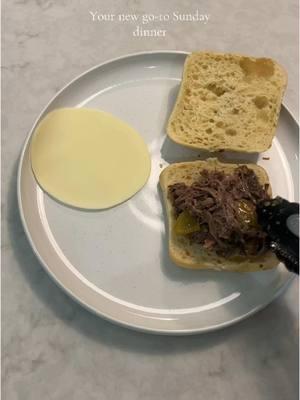 We have been absolutely loving these Mississippi Pot Roast Sandwiches recently.  They’re such an easy dinner to throw in the crockpot and have dinner ready to-go. I also love that there are very few ingredients, you’ll need  - chuck roast - 1 packet of au jus - 1 packet of ranch dressing mix - 1 stick of butter cut up into chunks - 1 large jar of pepperoncinis Combine everything in a crockpot and cook on low for 8 hours, and ta-da you now have a delicious meal. I prefer mine on a ciabatta bun with melted provolone cheese. I’m by no means a chef, but I get zero complaints on these sandwiches 🤪 #easydinner #DinnerIdeas #crockpotrecipes #quickrecipes #mississippipotroast #easydinnerideas #slowcookerrecipe 