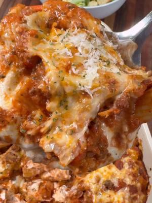 Cheesy Baked Rigatoni is an easy pasta dish the whole family loves!  INGREDIENTS  16 oz rigatoni pasta  1 lb ground beef 1 chopped onion 1/2 tsp each salt and pepper 1 tsp each garlic powder, paprika, Italian seasoning  1/4 tsp red pepper flakes 1 tbsp minced garlic  2 (24 oz) jars marinara 1/2 cup heavy cream  1 1/2 cups ricotta cheese 8 oz shredded mozzarella cheese  Dried parsley Parmesan cheese  INSTRUCTIONS  Preheat the oven to 375 degrees F.  Heat a pot of water over high heat and boil 16 oz of pasta following the directions on the package.  I used 16 oz of Rigatoni, but penne or ziti would also work for this recipe.  Heat a large skillet over medium-high heat. Add 1 lb of ground beef and a chopped onion. Season with salt, pepper, garlic powder, paprika, Italian seasoning, and red pepper flakes.  Once the ground beef is fully cooked, drain any extra grease and add 1 tbsp of minced garlic. Stir well. Add 2 jars of marinara sauce and 1/2 cup of heavy cream. Stir the sauce together and turn the heat off.  Pour half of the cooked pasta in a greased 9x13 baking dish. Add half of the meat/sauce mixture to the baking dish and stir the pasta around just to get them all covered in sauce. Next, use a large spoon to drop about 1 1/2 cups of ricotta cheese all over the first layer of the pasta.  Top the ricotta cheese with half of the shredded mozzarella. Add the rest of the pasta, meat/sauce mixture, and the rest of the shredded mozzarella cheese.  Bake in the oven at 375 degrees F for about 25 minutes uncovered. Once the cheese is golden brown and bubbling, it’s time to eat! Top with dried parsley and some Parmesan cheese. Enjoy!  #EasyRecipes #dinner #pasta #bakedrigatoni#meals #cheesypasta 