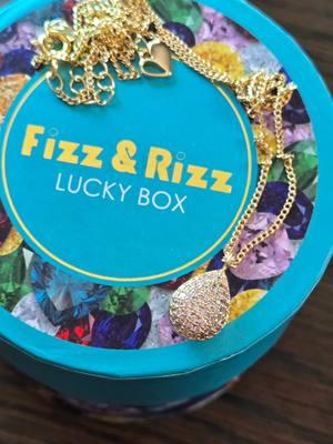 I love mystery box stuff and jewelry. I got this cute little necklace in my first Fizz & Rizz lucky box from Tiktok shop. Check it out in the shopping cart above my user name.  #mysterybox #mysteryboxes #mysteryjewelry #mysteryfizz  #mysteryjewelrybag #fizzandrizz #fizzandrizzbathbomb #bathbombjewelry #TikTokShop  #fizzandrizzjewelry #tiktokshopfinds 