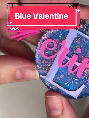 Make a keychain with me! This one is giving blue Valentine's Day vibes! #acrylickeychain #resinkeychain #acrylic #resin #resinpour #resinart #smallbusinessowner #supportsmallbusiness #SmallBusiness #smallbusinesscheck #like #tiktok #tiktokmademebuyit #tiktoktrending #trending #fyp #foryou #foryoupage #pink #holographic #white #blue #purple #hotpink #creative #create #art #artistsoftiktok #sparkle #sparkley #glitter #glitterkeychain #bellalofacreations