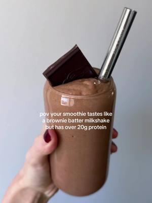 Brownie batter smoothie on repeatttt 🌀🤤🍫 find me on the other plat forms if you want to keep getting my recipes just in case! 😭  1 frozen banana 1/3 cup frozen avocado chunks 1 blender bomb (optional) 1 Tbs cocoa powder 1 scoop brownie batter protein powder (mine is from @Clean Simple Eats ) 1 cup almond milk Blend all ingredients together in a high speed blender until smooth. Transfer to a cup and top with a piece of dark chocolate. enjoy! #smoothies #smoothie #smoothierecipes #healthysmoothies 