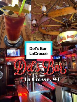 Del’s Bar- La Crosse, WI. Take a tour of this Iconic Historic bar in the heart of La Crosse. They’re known for a famous Bloody Mary #WisconsinBars #pizza #bloodymarypizza #bloodymary #famousbloodymary #placestoeatinwisconsin #wanderinwisconsin #wiscobars #wanderinwi 