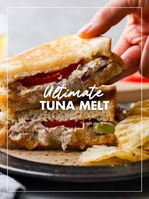 This really is the ultimate tuna melt! Ingredients: -16 ounces tuna fish, drained -1/4 cup mayonnaise -1/4 cup celery, finely chopped -1/4 cup red onion, finely chopped -1 tablespoon dijon mustard -2 tablespoons parsley, chopped -salt and pepper, to taste -16 slices bread -8 slices cheddar cheese, more if you want a layer on the bottom -tomato, sliced -1/4 cup butter, softened Full recipe linked in bio #fyp #tunamelt #disneylandrecipes #EasyRecipes #coldweatherfood #therecipecritic