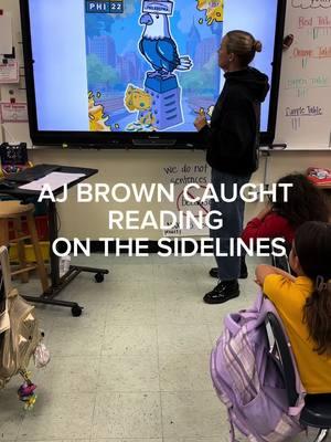 even NFL stars read 📖 AJ brown caught reading during his wild card matchup 🫨 #nfl #teacher #teachersoftiktok #football #footballtiktok #eagles #philly #read 