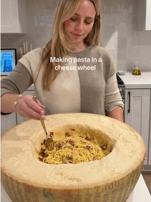 Part 2 of making pasta in a cheese wheel from Italy 🍝🧀 tonight we’re making carbonara 🫶🏼  #pasta #cheese #cheesewheel #carbonara #cheesewheelpasta #homemade #homemadepasta #parmigiano #parmigianoreggiano #fyp #viral #viralcheesewheelpasta #hosting #dinner #dinnerparty 