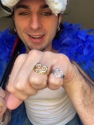 Drop next week??? 👀 @byLeonetti #animecosplay #onepieceliveactionnetflix #onepieceliveaction #onepiececosplay #trafalgarlaw #trafalgardwaterlaw #trafalgarlawedit #trafalgarlawcosplay #animejewelry #onepiecejewelry #onepiecerings #heartpiratering #firefistacering