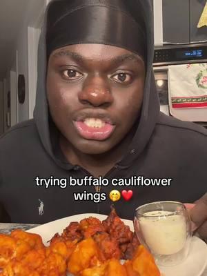 trying buffalo cauliflower wings ❤️🤭 would you try this? #califlowerwings #califlower #veganfood #veganrecipes 