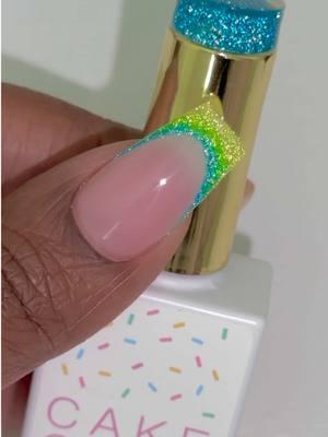 Cake Glaze G19-05 (light green) & G19-11 (blue) blended together into a beautiful reflective ombré 💅🏾. The neutral pink color is E02-21. Shop now from The Nail Cakery app or TheNailCakery.com 💕 #nails #nailart #gelnails #nailpolish #gelpolish #nailtech #manicure #thenailcakery #nailsupplies #blackowned #womanowned #reflectivenails #reflectivegel #glitter 