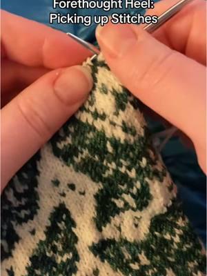 Adding a heel to a pair of knitted colorwork socks using the forethought heel method. Picking up stitches can be a little fiddly, but once they’re all back on the needles, the heel comes together relatively quickly!  #knittingtiktok #knittingtutorial #lordoftherings #lotr #colorworksocks #woolsocks 