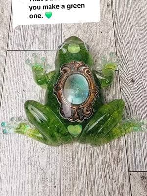 Replying to @christinalt1A special unique creation  #sharingiscaring #frog #frogsoftiktok #green #frogart #resin #Emerald #resinpassion #resinart #resin #bymonica #handmade #resinartist #resinartwork #art #obessed #resincraft #epoxyresin #SmallBusiness #epoxy #resinjewelry #homedecor #epoxyart #resina #artist #resincrafts #giftideas #crafting #handmadewithlove #supportsmallbusiness  #resincoasters #resinpour #resinwork #qvc #glitter #DIY #etsy #Love #resinkeychains  #epoxyresinart #resinobsession #gifts #diyproject  #artmadewithlove #art #decor #nature #demolding #resindemolding #viral #fyp  #trending #trendingvideo 