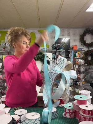 Make a winter bow with Lorie! This bow is going to look great on a mailbox.  Shop ribbons at tmigifts.com #mailboxbow #bowmaking #bowtutorial 