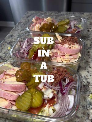 Quick and easy lunch for the week, Jersey Mikes sub in a tub. So gooood, you’ll have to try it!!  Not videoed is me adding lots and lots of banana peppers   Meats I used buffalo style chicken breast and oven roasted turkey with pepper jack cheese . Added shredded lettuce as my base Add sliced tomatoes  Sliced red onions  Jalapeno peppers Banana peppers Sweet heat pickles 🌶️  A sprinkle of salt, pepper and oregano  Optional : bacon bits  Dressing of your choice—  olive oil, vinegar and Italian dressing.  #jerseymikes #copycat #EasyRecipe #subinatub #quickrecipes #lunchideas #lunchmeals #sandwich 