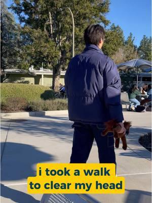 we love latitude market 🫶 #UCDavis | #Latitude video description: a student getting up from a table with a plushie in this hand and walking away, which then transitions into him entering latitude market